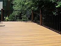 <b>Trex Transcend Tiki Torch Deck Boards with Vintage Lantern post and charcoal black railing and balusters</b>